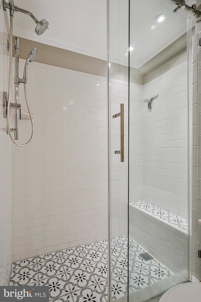 21591 Awbrey Pl, Broadlands, VA 20148 - bathroom with a shower stall, tile patterned flooring, and toilet