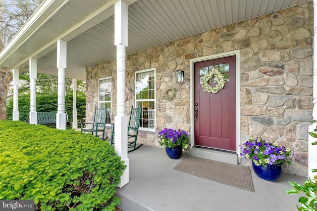 21591 Awbrey Pl, Broadlands, VA 20148 - entrance to property with stone siding and a porch