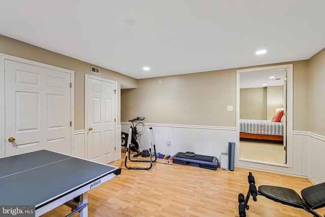 21591 Awbrey Pl, Broadlands, VA 20148 - workout room with wood finished floors, a wainscoted wall, and recessed lighting