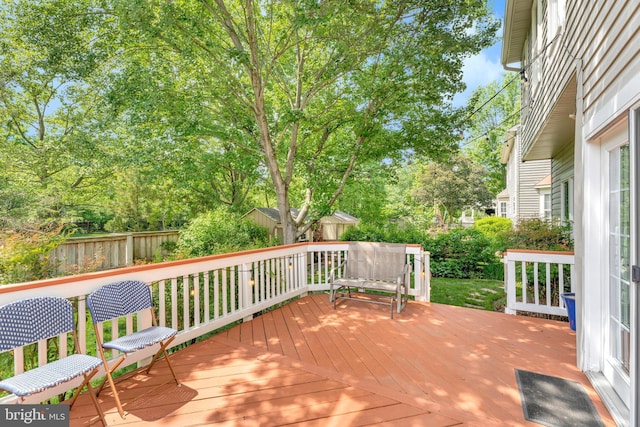 21591 Awbrey Pl, Broadlands, VA 20148 - wooden terrace featuring fence and view of wooded area