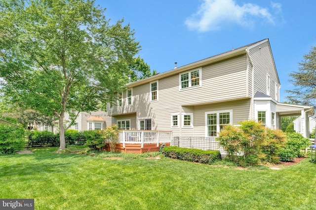 21591 Awbrey Pl, Broadlands, VA 20148 - rear view of house with a deck and a lawn