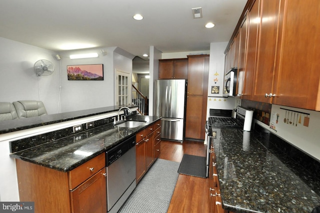 208 Starboard Way, Mount Laurel, NJ 08054 - kitchen featuring appliances with stainless steel finishes, a sink, dark wood-style floors, dark stone countertops, and recessed lighting