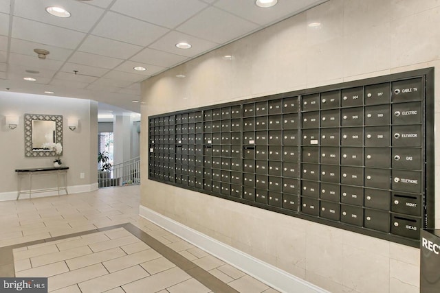 view of home's community featuring mail area