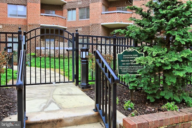 view of gate featuring fence