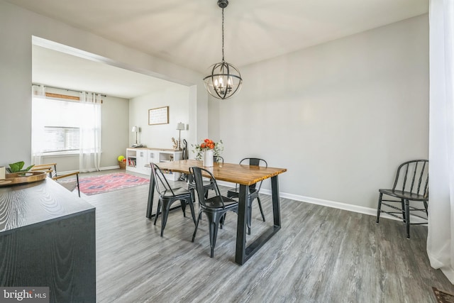 31 Walters Way, Dover, DE 19904 - dining room with a chandelier, wood finished floors, and baseboards