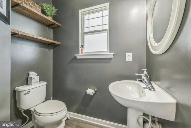 31 Walters Way, Dover, DE 19904 - bathroom with toilet, baseboards, wood finished floors, and a sink