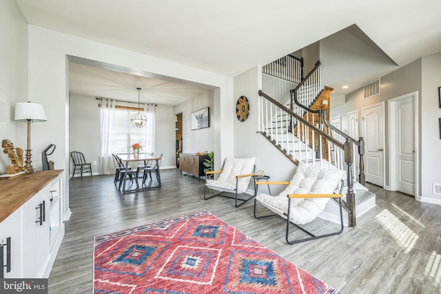 31 Walters Way, Dover, DE 19904 - living area with wood finished floors, baseboards, and stairs