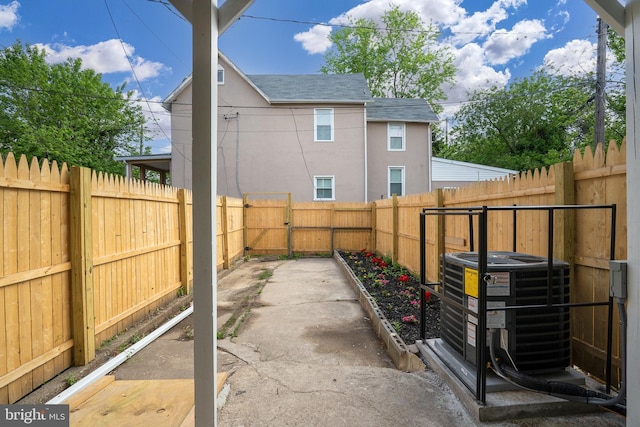 view of patio featuring a fenced backyard and cooling unit