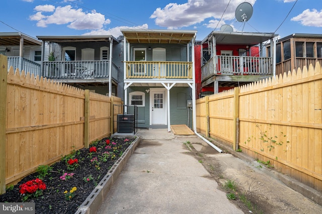 view of front of home featuring a fenced backyard