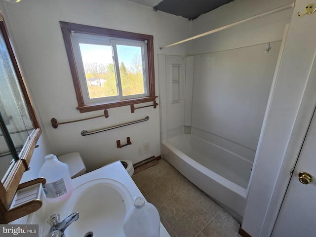 full bathroom with a sink and shower / bathing tub combination