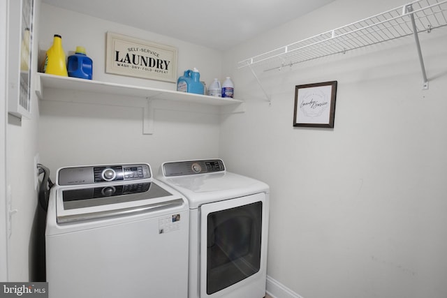 2350 Merseyside Dr, Woodbridge, VA 22191 - laundry area featuring washer and dryer and baseboards