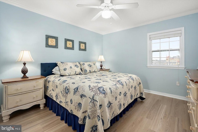 18 79th St Unit 403, Ocean City, MD 21842 - bedroom featuring light wood-style flooring, ornamental molding, baseboards, and a ceiling fan