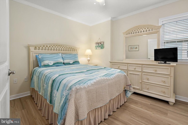18 79th St Unit 403, Ocean City, MD 21842 - bedroom with light wood-type flooring, ornamental molding, and baseboards