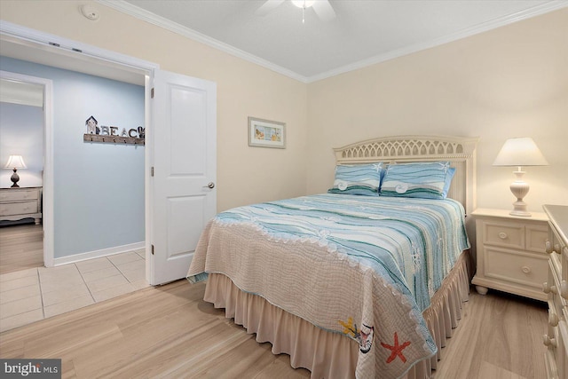 18 79th St Unit 403, Ocean City, MD 21842 - bedroom featuring light wood-style flooring, crown molding, baseboards, and a ceiling fan