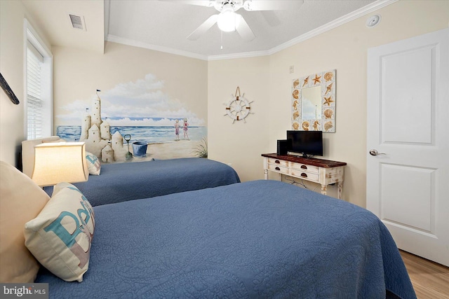 18 79th St Unit 403, Ocean City, MD 21842 - bedroom featuring wood finished floors, crown molding, and a ceiling fan