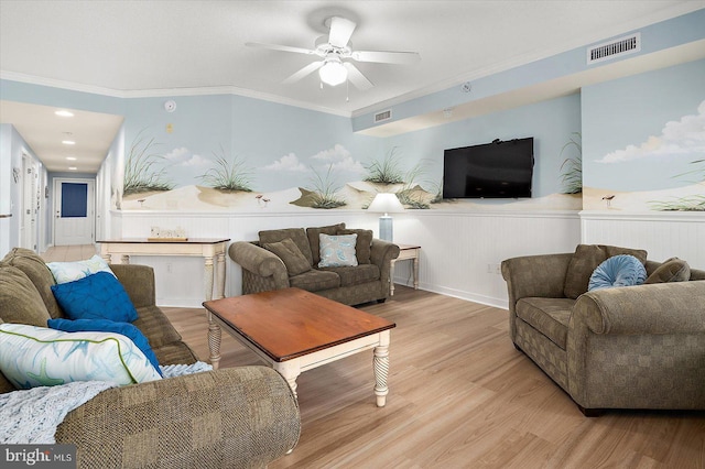 18 79th St Unit 403, Ocean City, MD 21842 - living area with a wainscoted wall, ceiling fan, light wood-style flooring, and crown molding