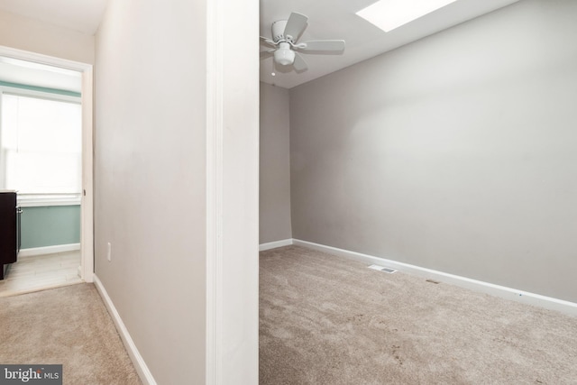 2012 Eagle St, Baltimore, MD 21223 - unfurnished room with baseboards, a ceiling fan, carpet flooring, and visible vents