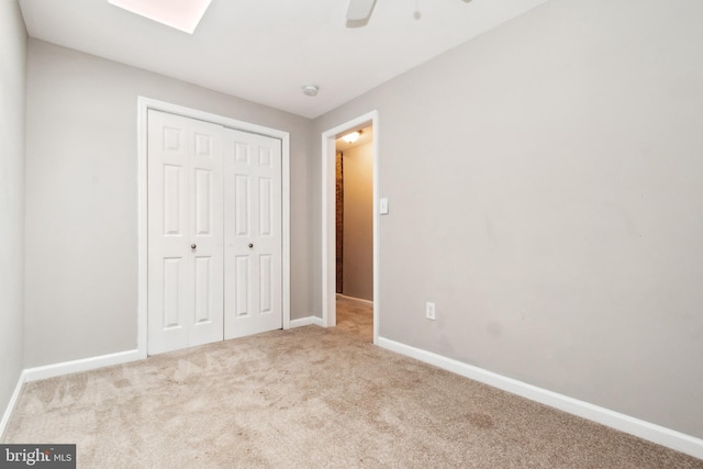 2012 Eagle St, Baltimore, MD 21223 - unfurnished bedroom featuring a ceiling fan, baseboards, carpet, and a closet