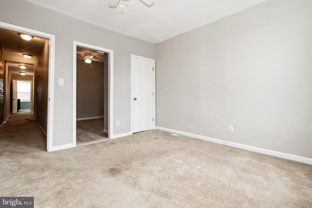 2012 Eagle St, Baltimore, MD 21223 - unfurnished bedroom with carpet floors, baseboards, a closet, and ceiling fan