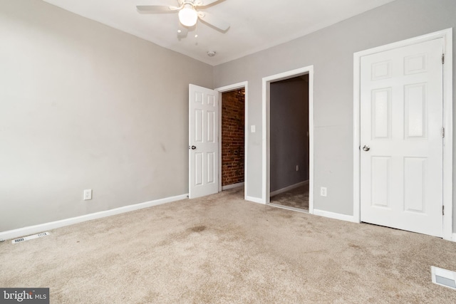 2012 Eagle St, Baltimore, MD 21223 - unfurnished bedroom featuring baseboards, ceiling fan, carpet, and visible vents