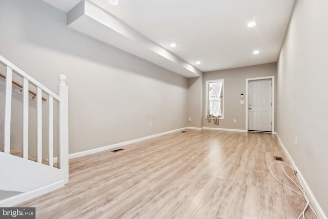 2012 Eagle St, Baltimore, MD 21223 - interior space with visible vents, stairway, baseboards, recessed lighting, and light wood-style flooring