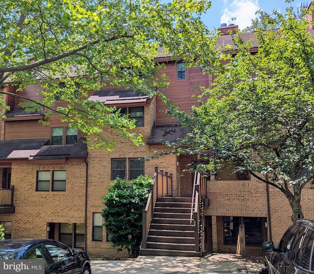 view of building exterior with stairs