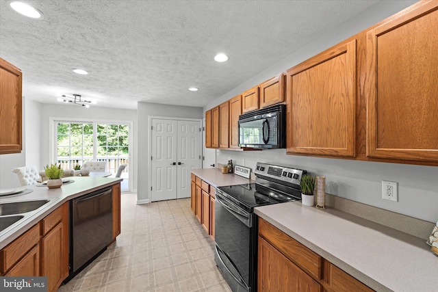 kitchen with electric range oven, black microwave, dishwasher, recessed lighting, and light floors