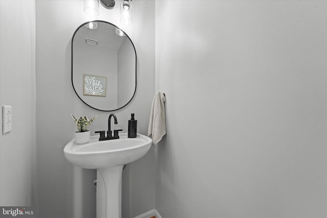 bathroom featuring baseboards