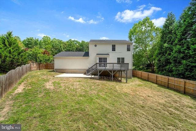 back of house featuring a wooden deck, a patio area, and stairway