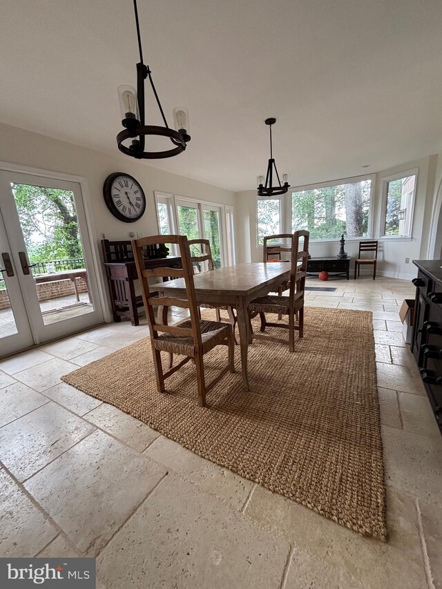 11500 Springridge Rd, Potomac, MD 20854 - dining room with stone tile flooring, a chandelier, and healthy amount of natural light