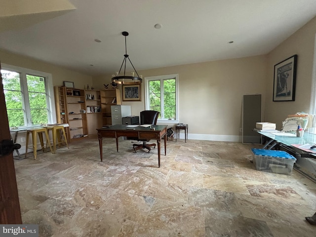 11500 Springridge Rd, Potomac, MD 20854 - office space featuring stone finish flooring, baseboards, and a chandelier