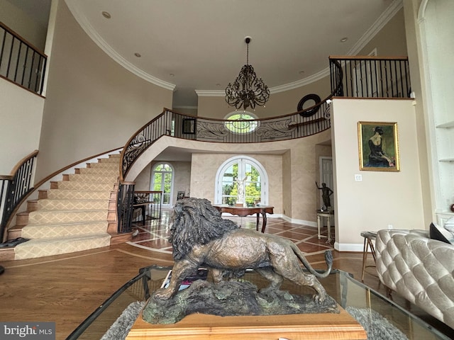 11500 Springridge Rd, Potomac, MD 20854 - living room featuring stairs, a towering ceiling, ornamental molding, a chandelier, and baseboards