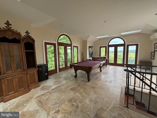 11500 Springridge Rd, Potomac, MD 20854 - game room with french doors, stone tile flooring, vaulted ceiling, billiards, and a wall mounted AC