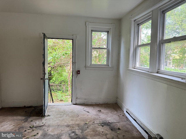 531 N 63rd St, Philadelphia, PA 19151 - doorway featuring baseboards, plenty of natural light, and a baseboard radiator