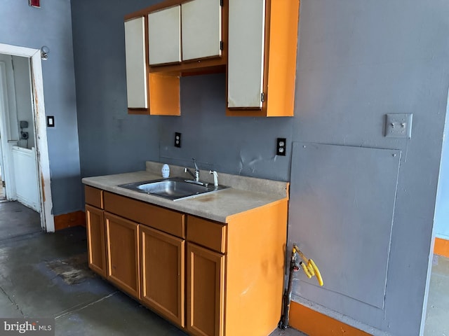 531 N 63rd St, Philadelphia, PA 19151 - kitchen with a sink, concrete flooring, and light countertops