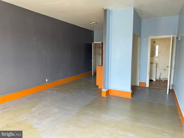 531 N 63rd St, Philadelphia, PA 19151 - empty room with concrete flooring and baseboards