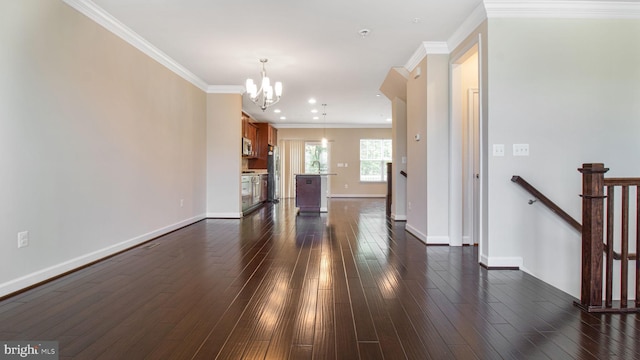 unfurnished living room with a chandelier, dark wood-type flooring, crown molding, baseboards, and recessed lighting