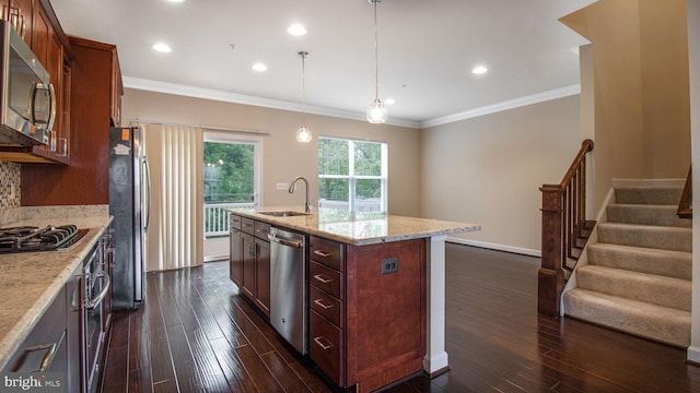 kitchen featuring a sink, appliances with stainless steel finishes, dark wood-style flooring, light stone countertops, and ornamental molding