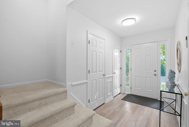 2505 Wheat Meadow Ct, Herndon, VA 20171 - foyer entrance featuring stairway, baseboards, and wood finished floors