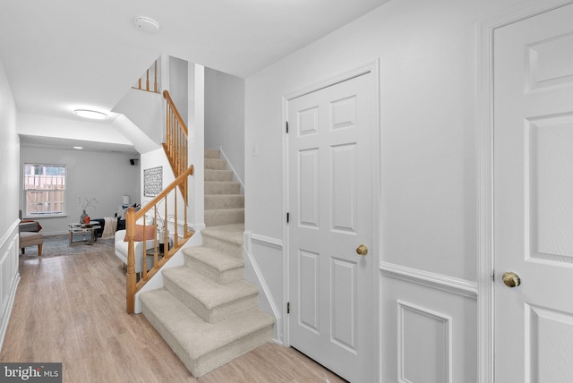 2505 Wheat Meadow Ct, Herndon, VA 20171 - stairs featuring wood finished floors and baseboards