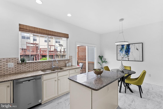 2505 Wheat Meadow Ct, Herndon, VA 20171 - kitchen featuring stainless steel dishwasher, a sink, light marble finish floors, decorative backsplash, and stone countertops