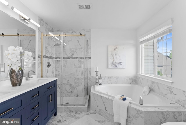 2505 Wheat Meadow Ct, Herndon, VA 20171 - bathroom featuring double vanity, a garden tub, a marble finish shower, and marble finish floors