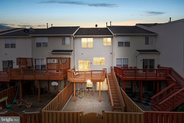 2505 Wheat Meadow Ct, Herndon, VA 20171 - rear view of property featuring stairs, a fenced backyard, a patio area, a deck, and a gate