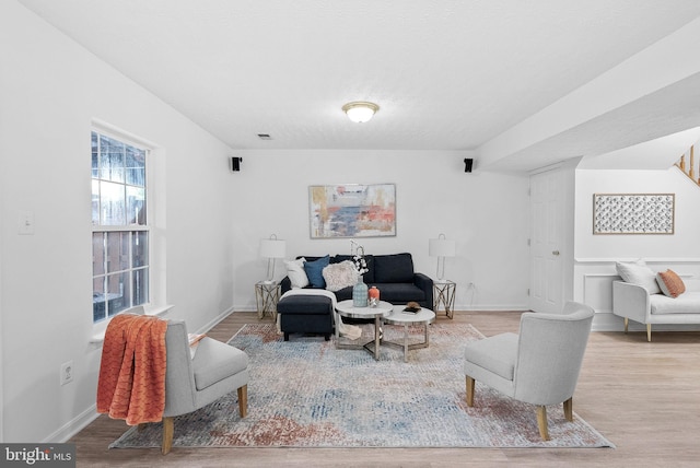 2505 Wheat Meadow Ct, Herndon, VA 20171 - living room featuring wood finished floors and baseboards