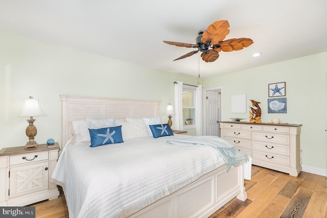 bedroom with light wood-type flooring, baseboards, ceiling fan, and recessed lighting