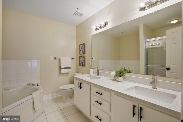full bath featuring tile patterned floors, toilet, a shower stall, a bath, and double vanity