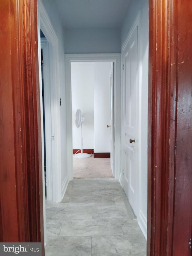 corridor with baseboards