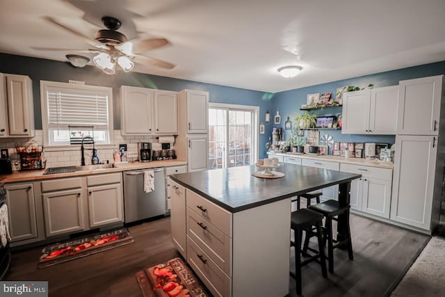 230 Jewel Dr, York, PA 17404 - kitchen featuring dishwasher, ceiling fan, a kitchen bar, backsplash, and open shelves
