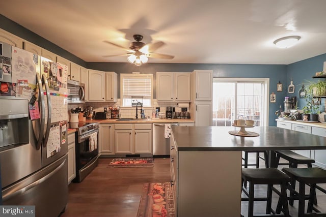 230 Jewel Dr, York, PA 17404 - kitchen featuring appliances with stainless steel finishes, a sink, healthy amount of natural light, and a ceiling fan