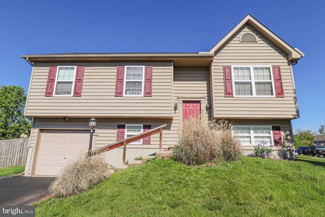230 Jewel Dr, York, PA 17404 - split foyer home with an attached garage and asphalt driveway